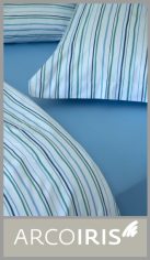 Juego sabanas ARCO IRIS de 1½ plazas, percal 180 hilos 100% algodón. Sabana superior de 1.70m x 2.50m, sabana ajustable de 1.00m x 1.95m y funda de 0.50m x 0.70m para colchones de hasta 30 cm. Motivos surtidos. Pack por unidad envase de PVC.