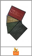 Felpudo con base de goma BARAK para la entrada de la casa, confeccionada en poliéster, con modelos rectangulares fantasías surtidas. Medidas 40cm x 60cm. Colores clásicos surtidos. Pack por unidad.