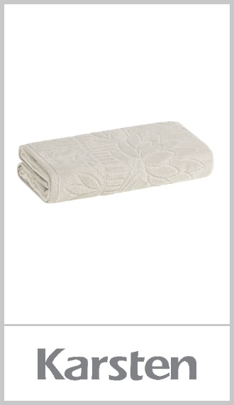 Toallon Karsten modelo Lotus 100% algodón, con gramaje de 440g/m² y cuerpo tejido en jacquard con motivos florales, que le dan un toque decorativo además de funcional. Toque suave y buena absorción, con acabado antipilling y tratamiento pre-encogido para mantener su forma después de lavados. Disponible en varios colores. De medidas aproximadas 70cm x 140cm, una sola pieza. Pack por unidad.
