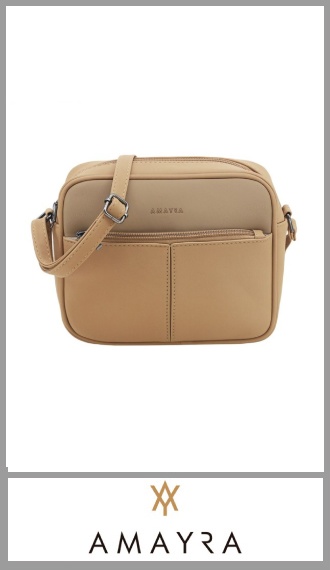 Cartera CAMEL AMAYRA para mujer, confeccionada en Pu de gran calidad, totalmente forrada en su interior, con un bolsillo plano en su interior con cierre, cuenta con dos bolsillos exteriores, cuenta con una correa regulable.
Excelentes detalles y terminaciones según imagen. Pack por unidad.
Tamaño 17cm  X 20cm  X  6cm